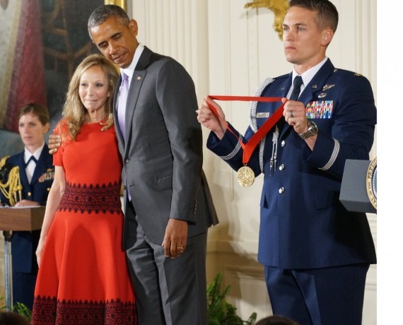 Rebecca Goldstein being given a medal of honour by US President Barack Obama