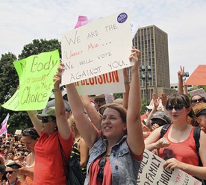 Women's rights activists seen at a pro-choice rally in Austin.